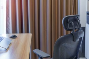 Ergonomic chair and Adjustable table with laptop computer