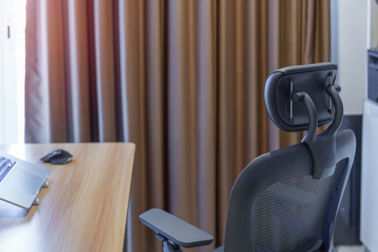 Ergonomic chair and Adjustable table with laptop computer