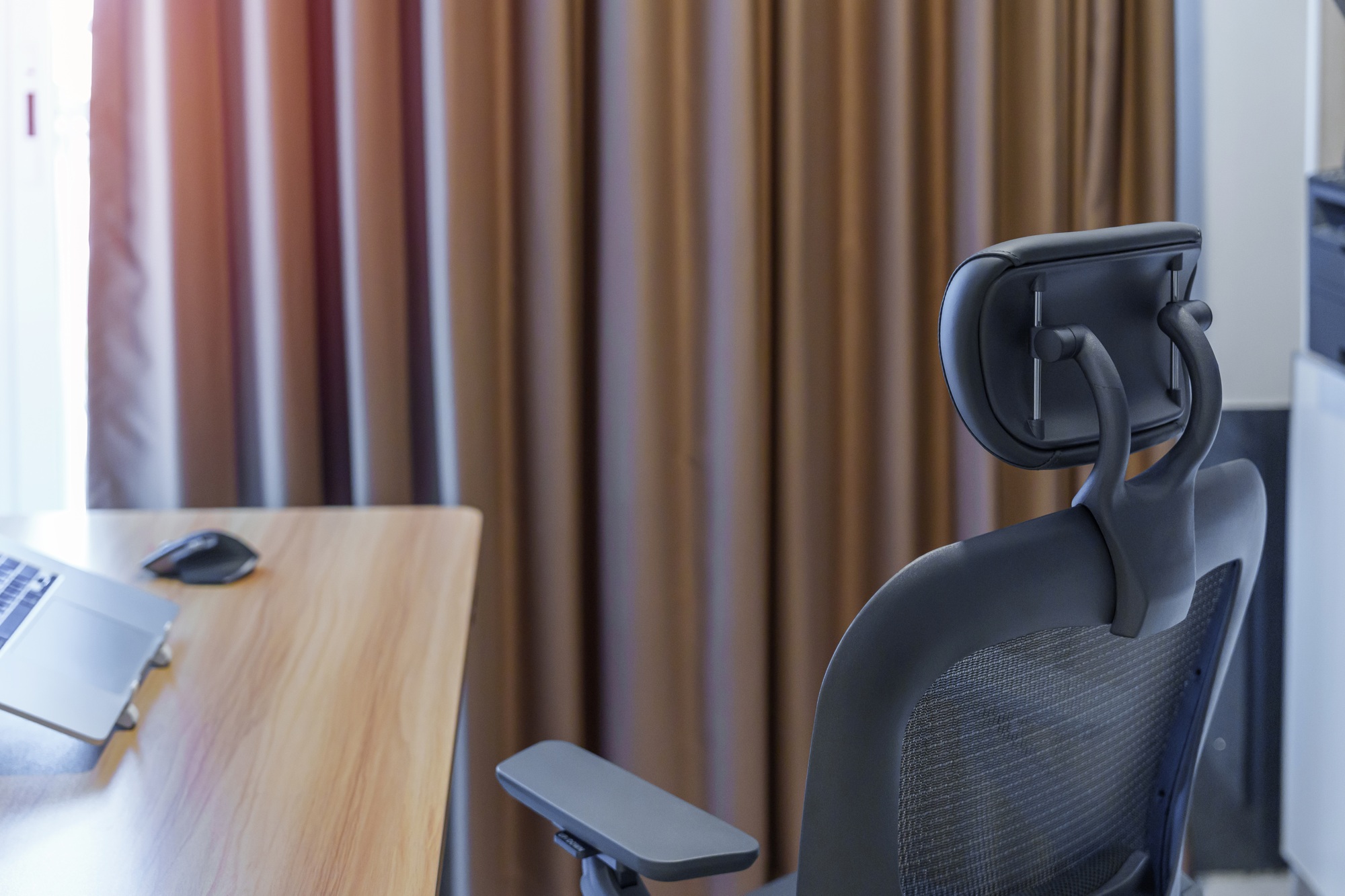Ergonomic chair and Adjustable table with laptop computer