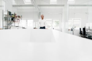 Mature businessman at conference table in office
